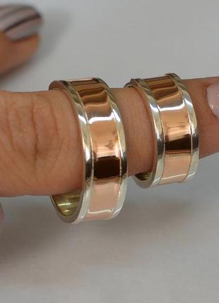 Обручальное кольцо серебряное с вставками из золота1 фото