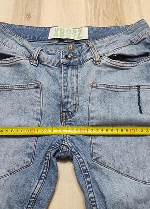 Широкі джинсові шорти на підлітка9 фото