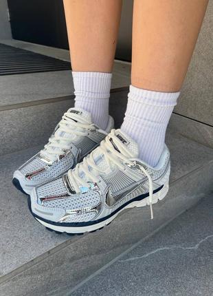 Женские кроссовки nike zoom vomero photon dust metallic