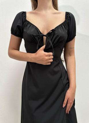 Найтрендовіша чорна довга сукня з розрізом літо тренд 20232 фото