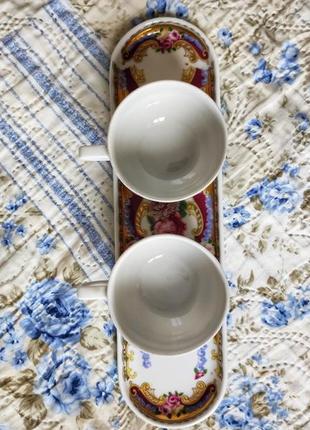 Порцеляновий сет з кавових чашечок на підставці, limoges, франція3 фото