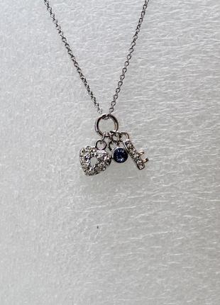 Оригінальна кольє - сердечко-замок з ключем і каменем.