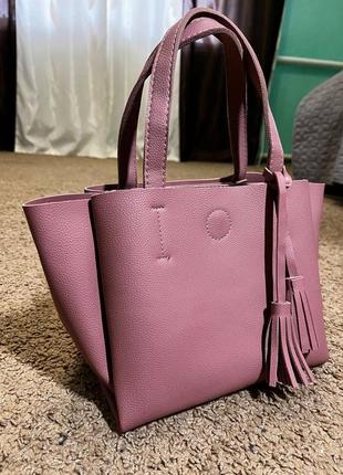 Женская сумка розового цвета