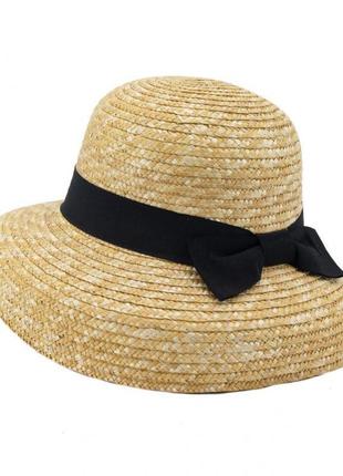 Соломенная шляпа женская солнцезащитная с черной лентой с бантом цвет бежевый (соломенный) 56-582 фото