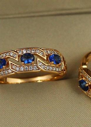Кольцо xuping jewelry волнорез с синими камнями р 18  золотистое