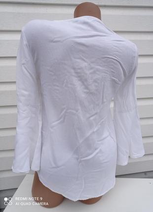 Блуза с переплетом2 фото