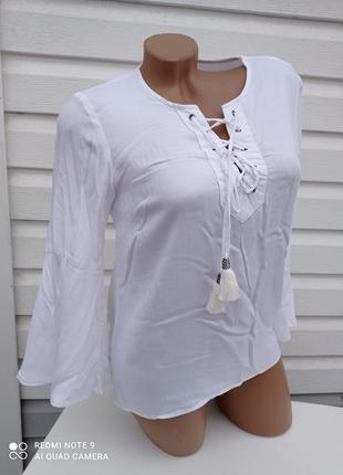 Блуза с переплетом1 фото