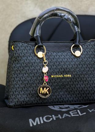 Женская сумка в стиле michael kors2 фото