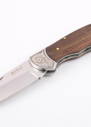 Нож  складной классического плана, с рукоятью из дерева полисандра