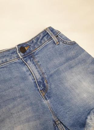 Короткі джинсові шорти з рваностями5 фото
