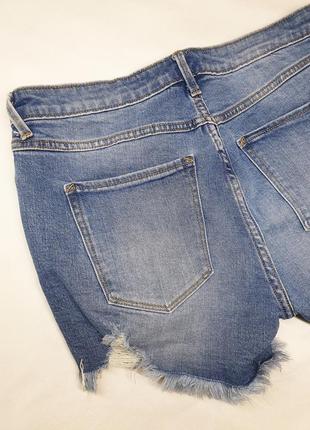 Короткі джинсові шорти з рваностями9 фото