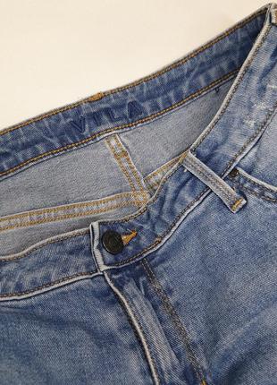 Короткі джинсові шорти з рваностями3 фото