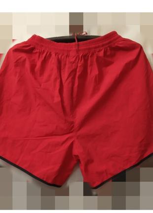 Чоловічі спортивні шорти, тканина плащівка, колір червоний з білими вставками, без сітки всередині, ідеальні для літнього відпочинку або спорту2 фото