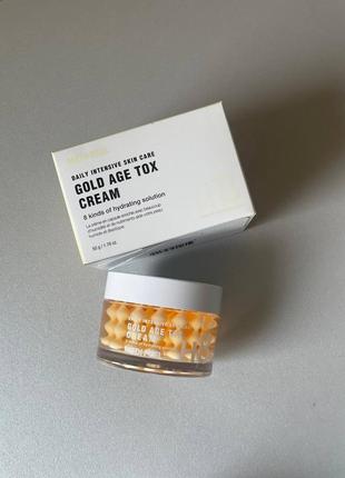 Антивіковий капсульний крем із екстрактом золотого шовкопряда, 50мл medi peel gold age tox cream1 фото