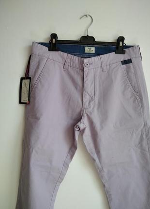 Фиолетовые женские штаны 48 размер7 фото
