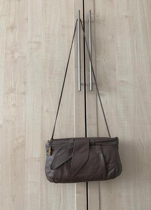 Кожаная сумка в винтажном стиле.4 фото