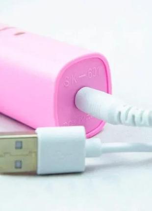 Электрическая зубная щетка shuke sk-601 аккумуляторная, розовая5 фото