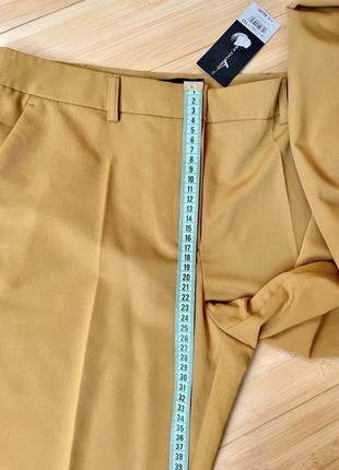 Елегантні гірчичні,завужені брюки з бічними кишенями8 фото
