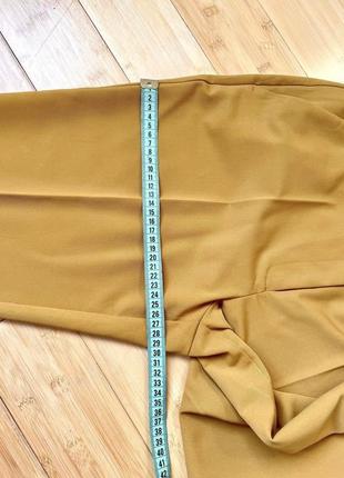 Елегантні гірчичні,завужені брюки з бічними кишенями9 фото