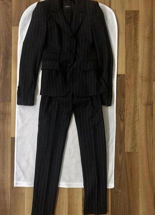 Брючний костюм у смужку розмір 42
