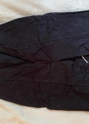 Юбка черная карандаш  с отделкой клепками ткань стретч4 фото