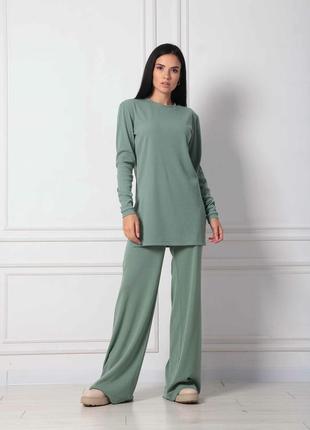 Модні зручні жіночі брюки андреа кльош від стегна трикотаж рубчик 42-56 розміри різні кольори
