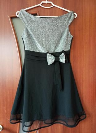 Платье черное с серебристым верхом б/у.1 фото