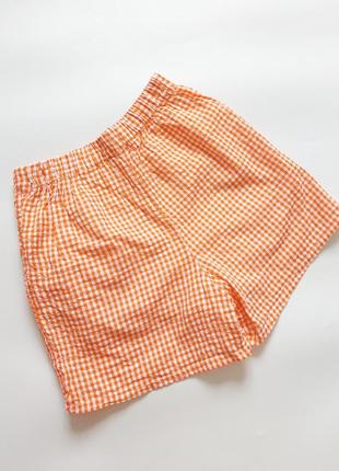 Жіночі шорти помаранчеві з принтом в клітинку з кишенями від бренду primark4 фото