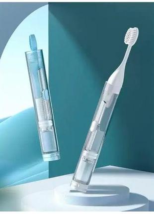 Складна зубна щітка із дозатором для зубної пасти блакитний