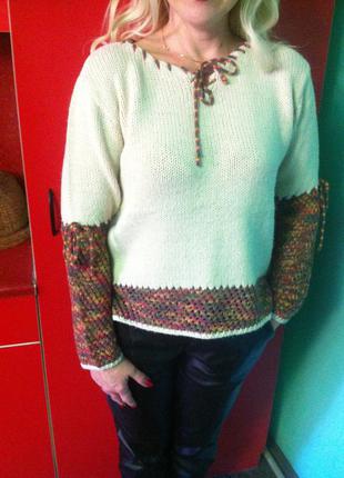 Нежный тёплый шерстяной свитер бренда  mogisa ( турция )с ажурным разноцветым этнопринтом1 фото