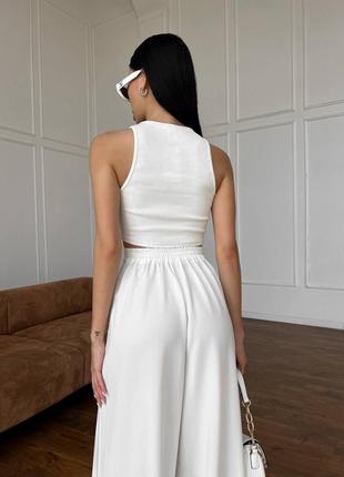 Білі брюки палаццо з високою посадкою5 фото