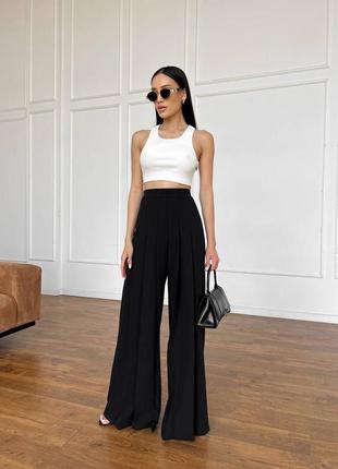 Чорні брьки палаццо з костюмної тканини