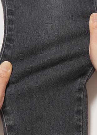 Жіночі джинси uniqlo з ефектом потертості6 фото