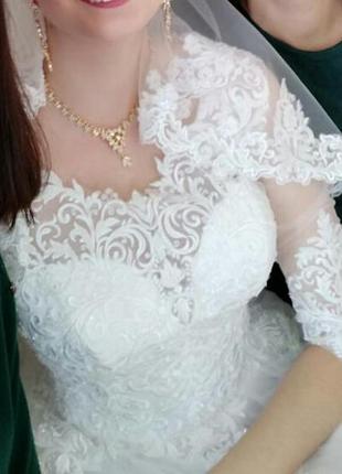 Шикарна весільна сукня2 фото