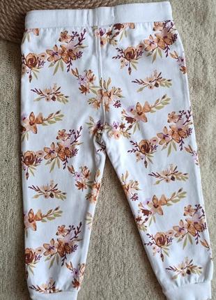 Спортивные штаны в цветочный принт 86 см.2 фото