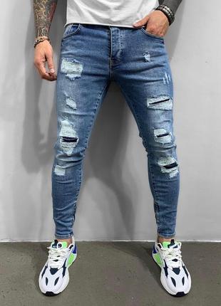 Вузькі чоловічі джинси синьго кольору (сині), джинсові штани з потертостями рвані аналог wrangler