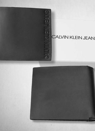 Мужской кожаный кошелек calvin klein embossed logo