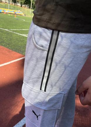 Спортивні штани puma сірі на манжеті3 фото