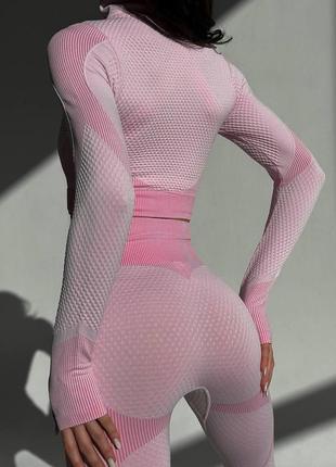 Жіночий фітнес костюм двійка складається з топу і легені норма10 фото