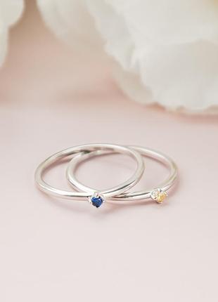 Комплект серебряный два кольца с синим и желтым фиантими по центру4 фото