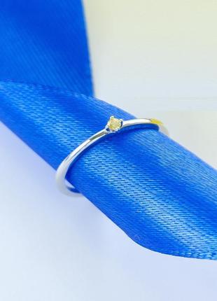 Комплект серебряный два кольца с синим и желтым фиантими по центру8 фото