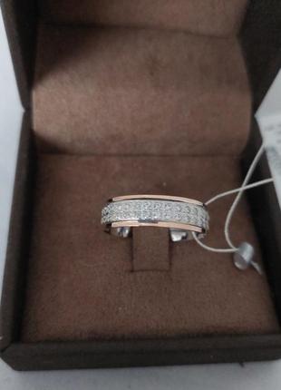 Срібна каблучка із золотими пластинами та фіанітом