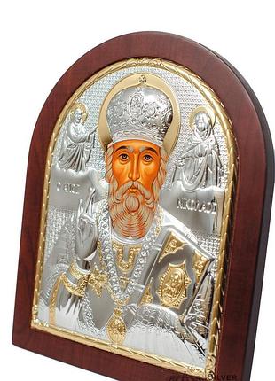 Серебряная икона николая чудотворца 8,1х9,7см арочной формы на дереве