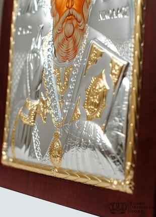 Серебряная икона николая чудотворца 8,1х9,7см арочной формы на дереве