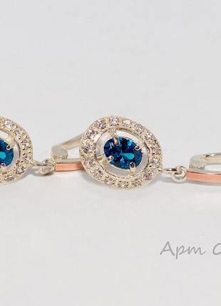 Серьги серебряные с золотыми напайками сиреневыми и белыми цирконами