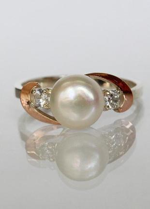 Серебряное кольцо с жемчугом и золотыми накладками4 фото