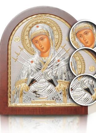 Серебряная икона семистрельная божья матерь 8,1х9,7см арочной формы на дереве