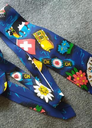 Краватка швейцарська.Едельвейс, годинник, сир, корова, картки. шовк1 фото
