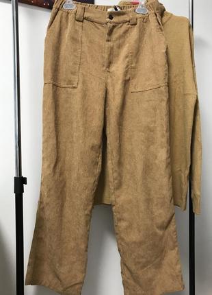 Стильные свободветовые брюки с крупными карманами