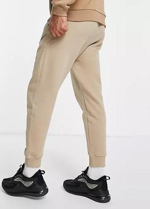 Утеплені штани на флісі nike sportswear m knitted joggers / dr9274-2473 фото